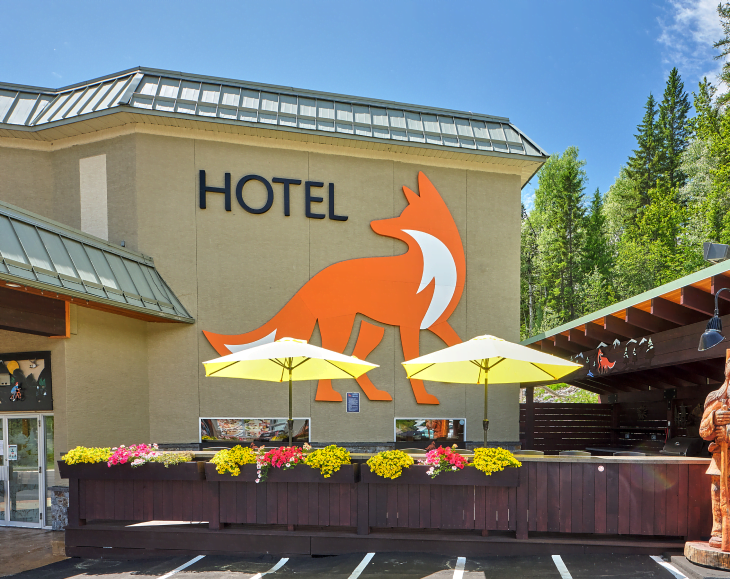 Fernie Fox Hotel with big Fox logo on side of building