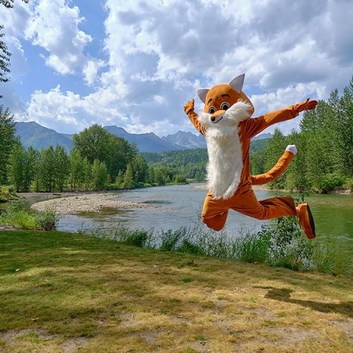 Fernie Fox mascot jumping for joy