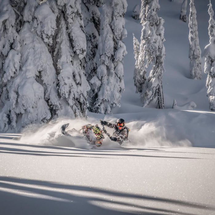 Snowmobiler in powder snow